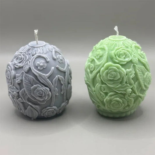 Set van twee luxe eivormige geurkaarsen met florale gravures in grijs en groen